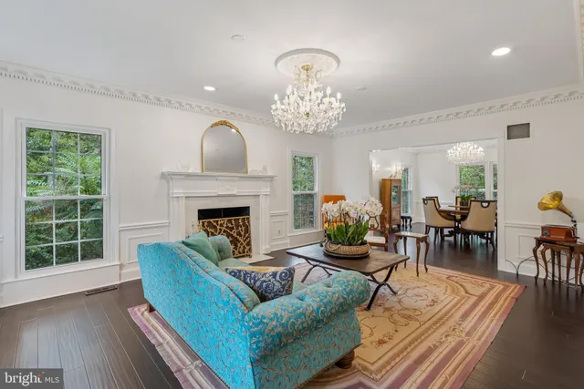a view of a livingroom with furniture and a fireplace