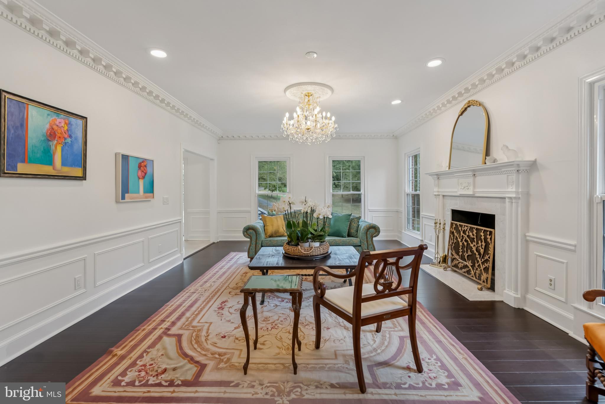 10900 Tara Road Potomac, MD 20854 - Photo 7 of 33 a view of a livingroom with furniture and a fireplace