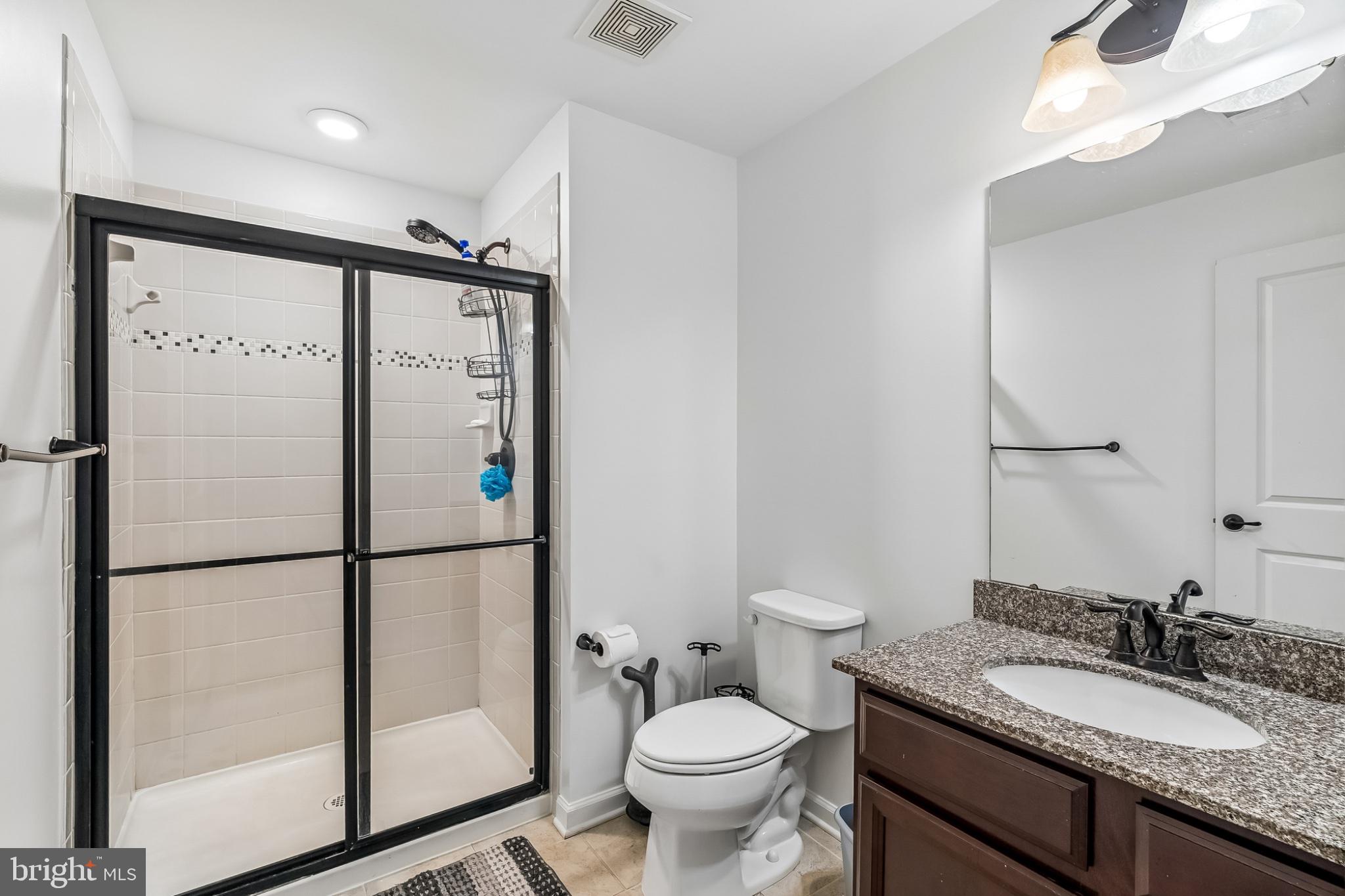 14081 Carriage Ford Road Nokesville, VA 20181 - Photo 30 of 40 Modern bathroom with sleek finishes.