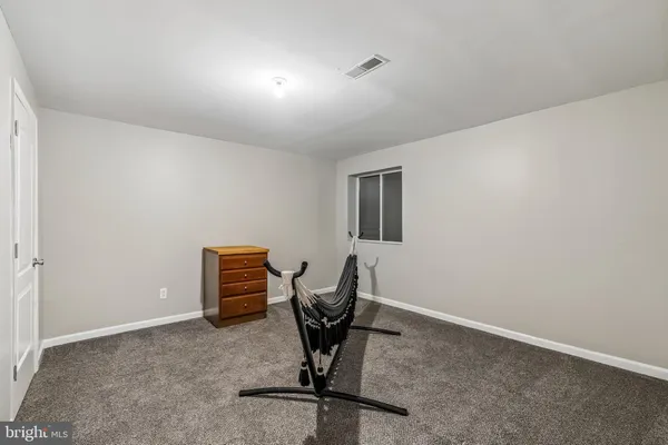 a room with furniture and windows