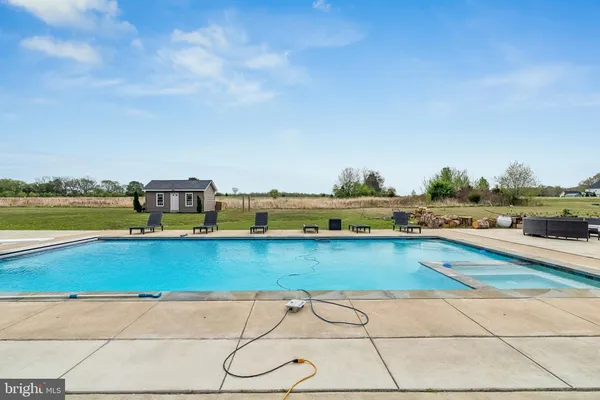 a view of a swimming pool and an ocean view
