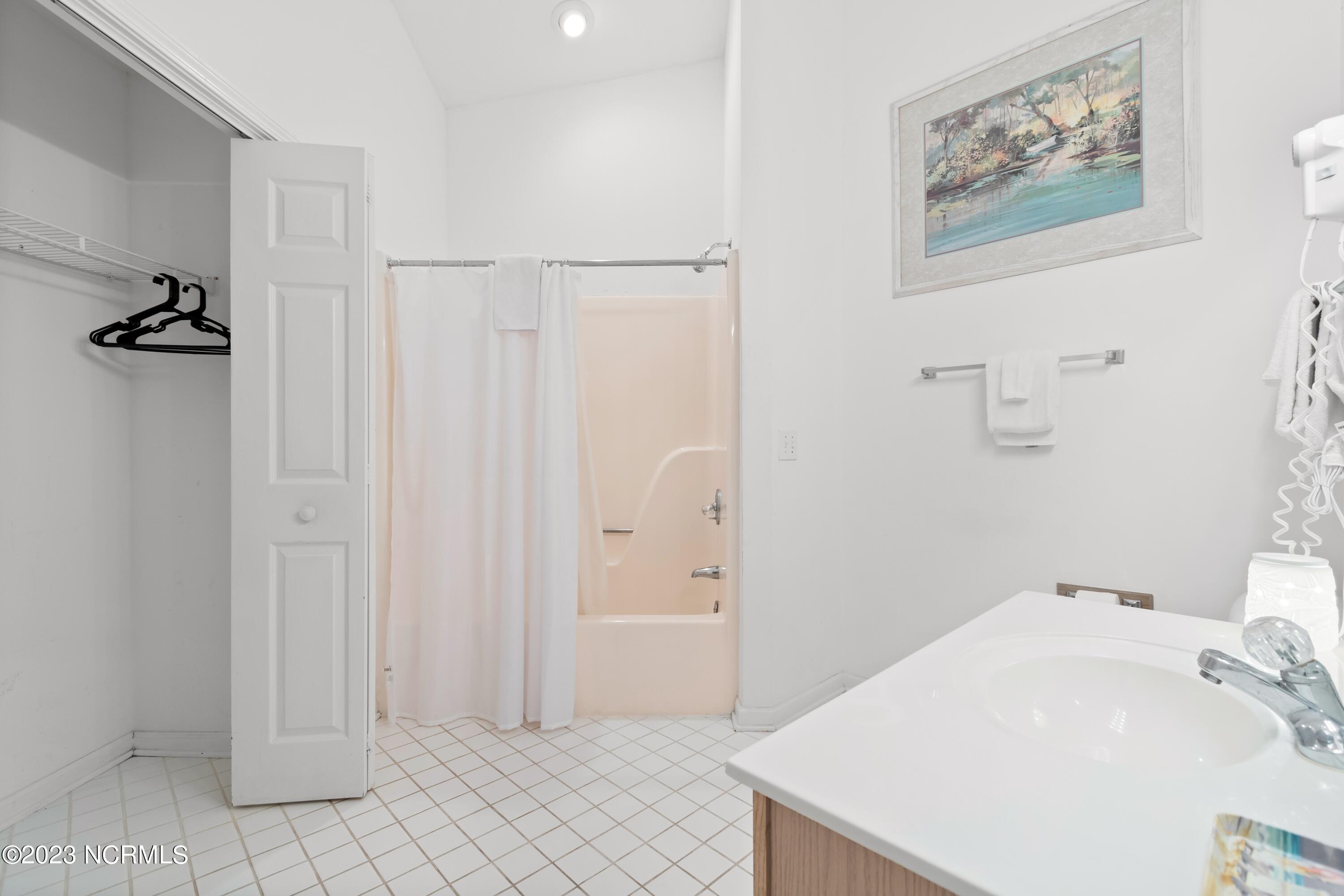 226 Clubhouse Road, Unit 17D Sunset Beach, NC 28468 - Photo 30 of 37 Enjoy an en-suite closet.