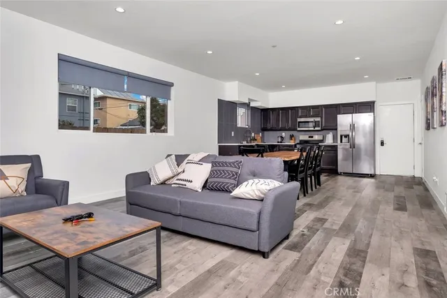 a living room with furniture and a table