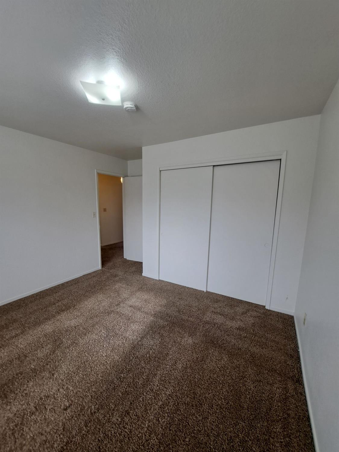 12486 Georgia Lane Madera, CA 93637 - Photo 13 of 17 a view of empty room