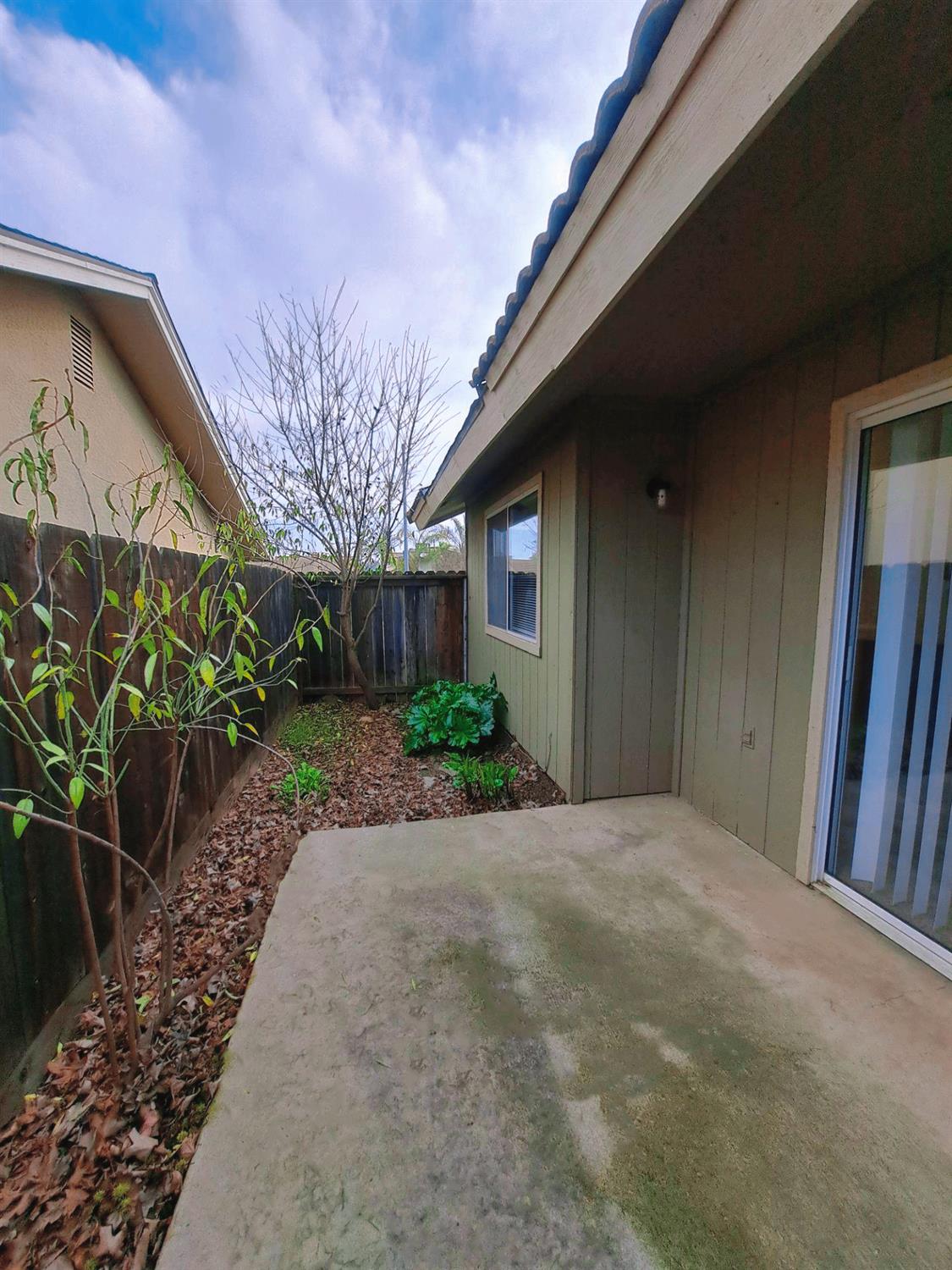 12486 Georgia Lane Madera, CA 93637 - Photo 15 of 17 a view of a backyard of the house