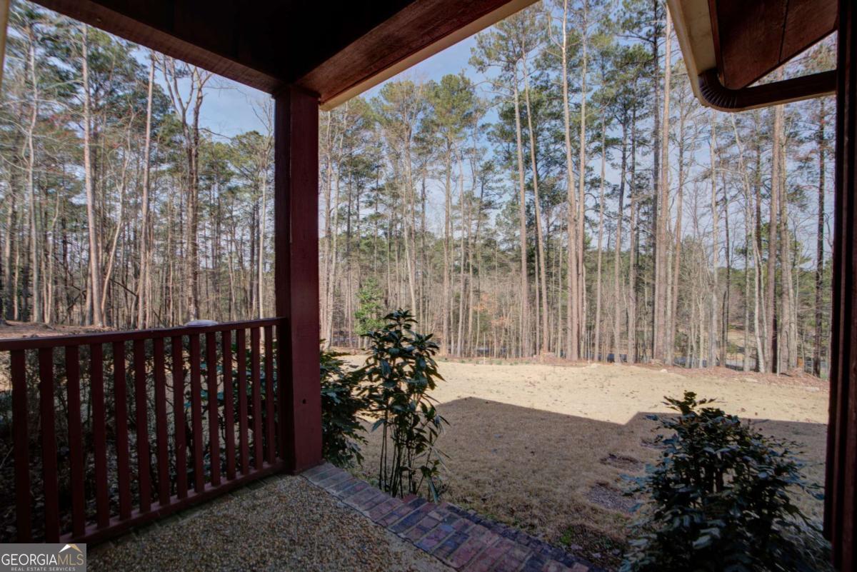 1043 Wilkerson Road Southwest Rome, GA 30165 - Photo 14 of 52 a view of a pathway of a building with a yard