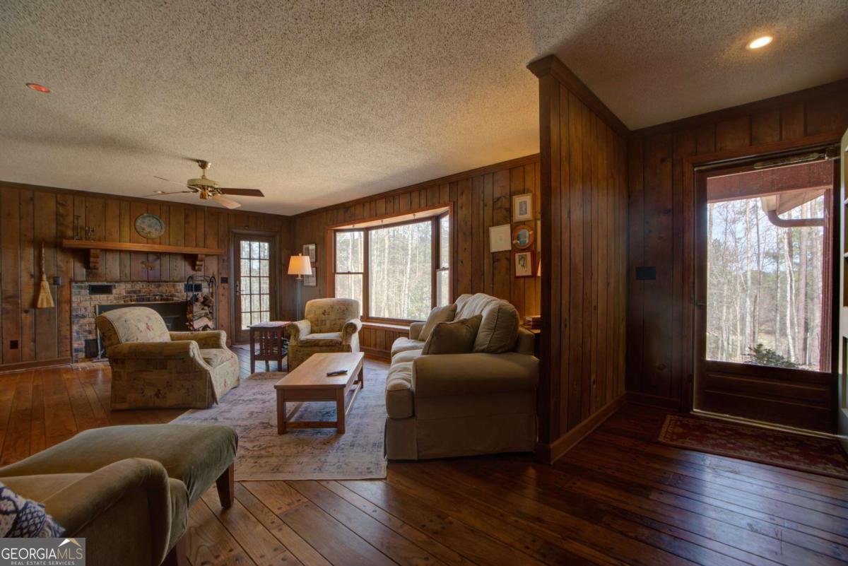 1043 Wilkerson Road Southwest Rome, GA 30165 - Photo 17 of 52 a living room with furniture and a window