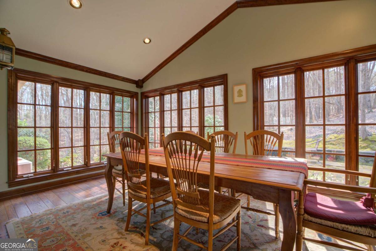 1043 Wilkerson Road Southwest Rome, GA 30165 - Photo 22 of 52 a view of a dining room with furniture window and wooden floor