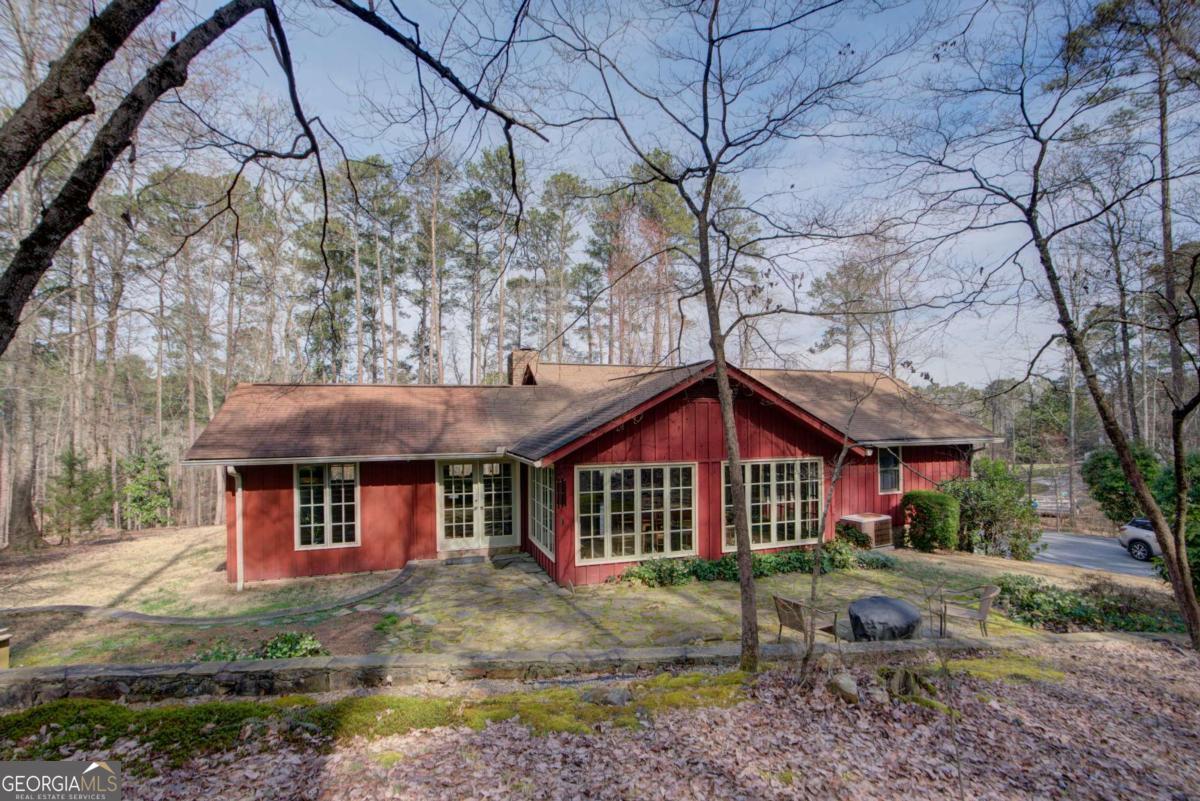 1043 Wilkerson Road Southwest Rome, GA 30165 - Photo 50 of 52 a front view of a house with garden