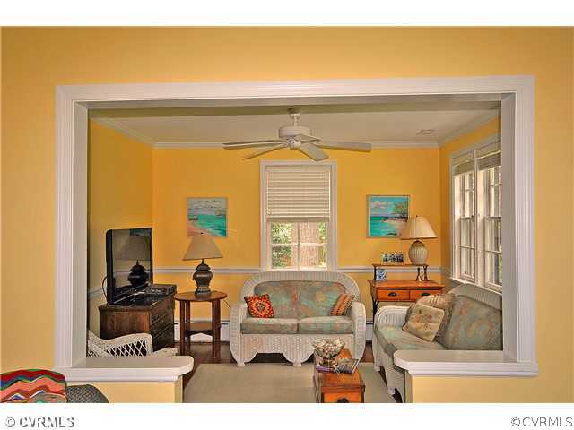 4237 Arrowhead Road Richmond, VA 23235 - Photo 5 of 14 a living room with furniture and a large window