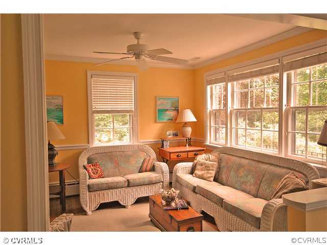 4237 Arrowhead Road Richmond, VA 23235 - Photo 6 of 14 a living room with furniture and a large window