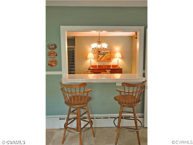 4237 Arrowhead Road Richmond, VA 23235 - Photo 8 of 14 a room with a table and chairs