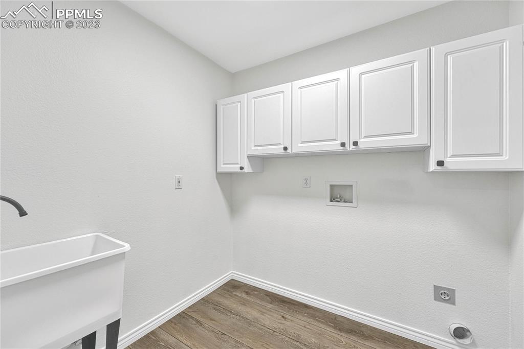 1185 Bowstring Road Monument, CO 80132 - Photo 20 of 46 a view of cabinets and wooden floor