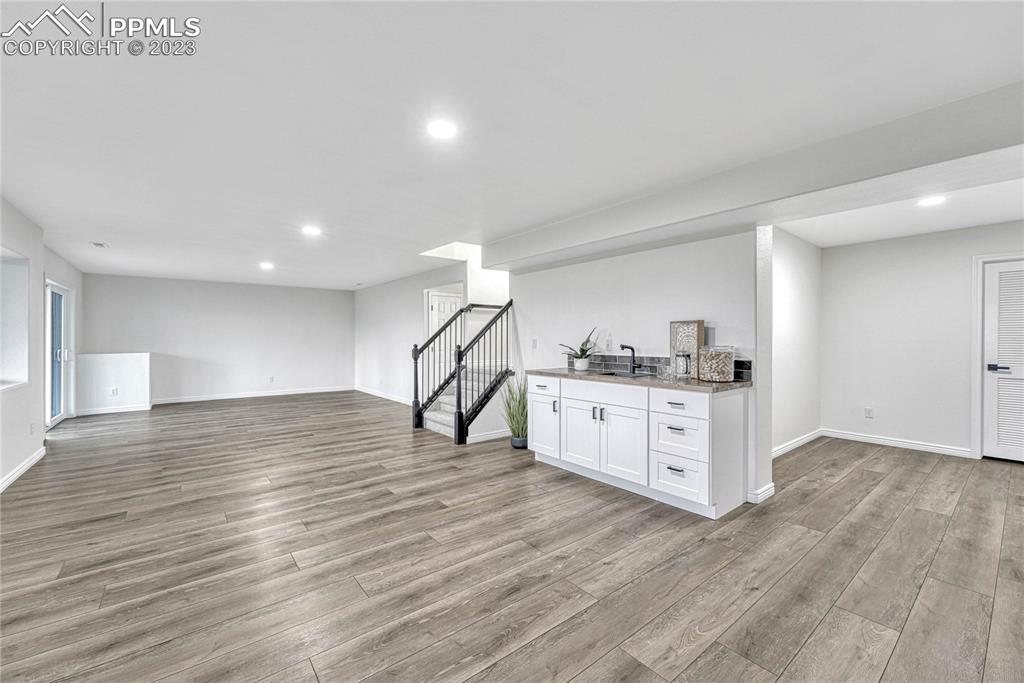 1185 Bowstring Road Monument, CO 80132 - Photo 33 of 46 a view of a kitchen with sink and natural light