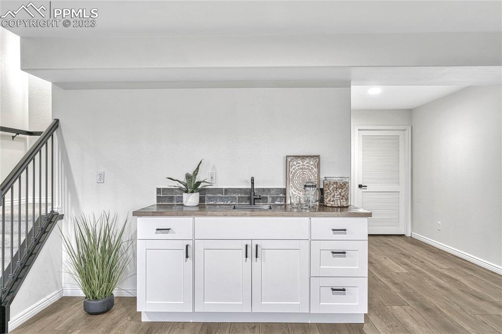 1185 Bowstring Road Monument, CO 80132 - Photo 34 of 46 a bathroom with a sink and a mirror