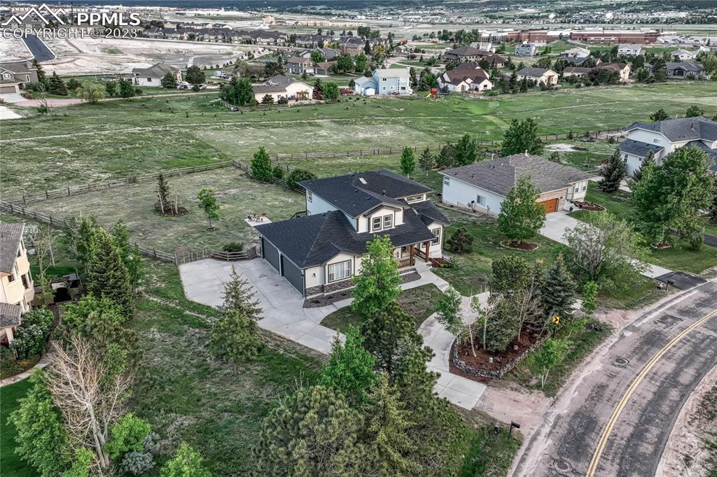1185 Bowstring Road Monument, CO 80132 - Photo 39 of 46 an aerial view of a house with outdoor space