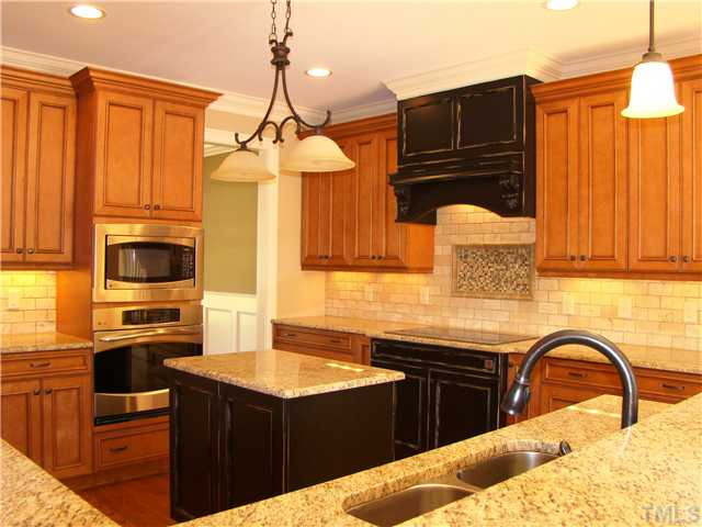 6305 Earle Ridge Lane Raleigh, NC 27606 - Photo 4 of 9 Gorgeous kitchen colors complement each other~ Kitchen