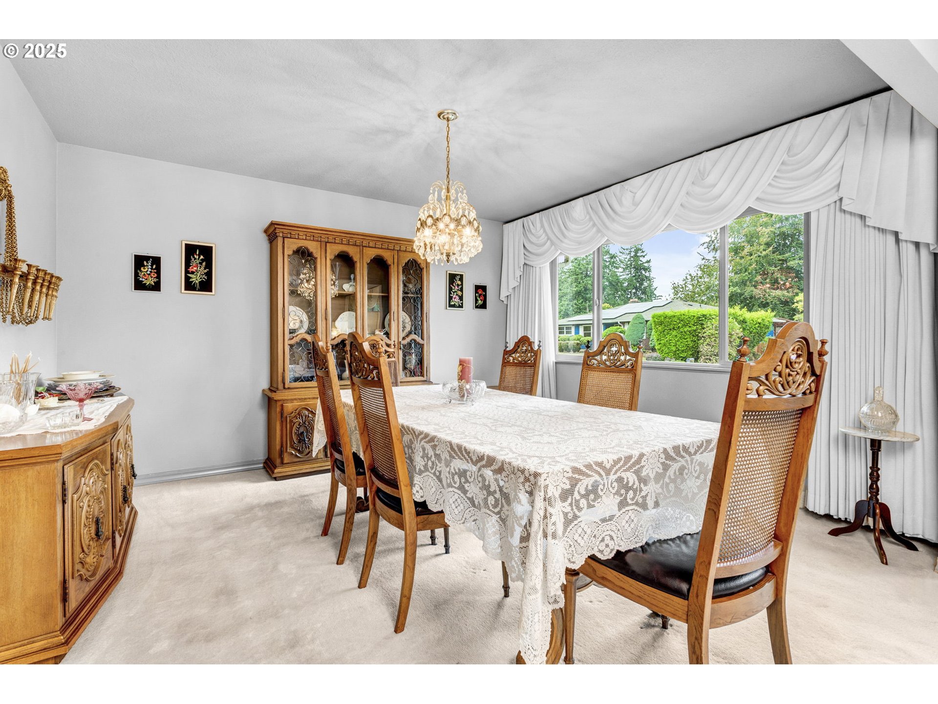 1114 Northeast 137th Avenue Portland, OR 97230 - Photo 12 of 45 a dining room with furniture a chandelier and window