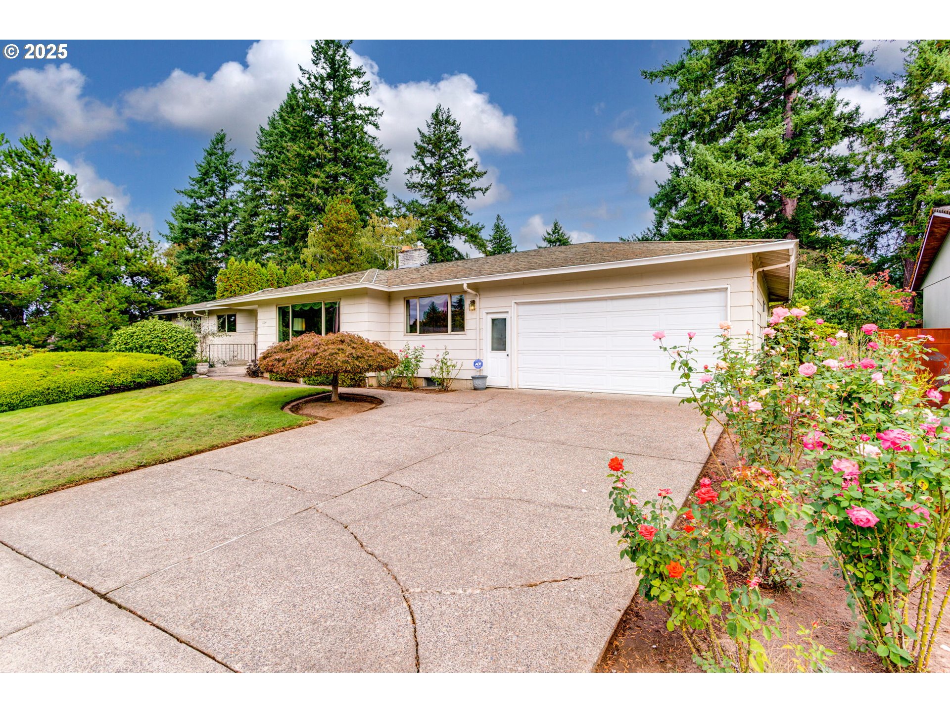 1114 Northeast 137th Avenue Portland, OR 97230 - Photo 2 of 45 a view of a house with a yard and potted plants