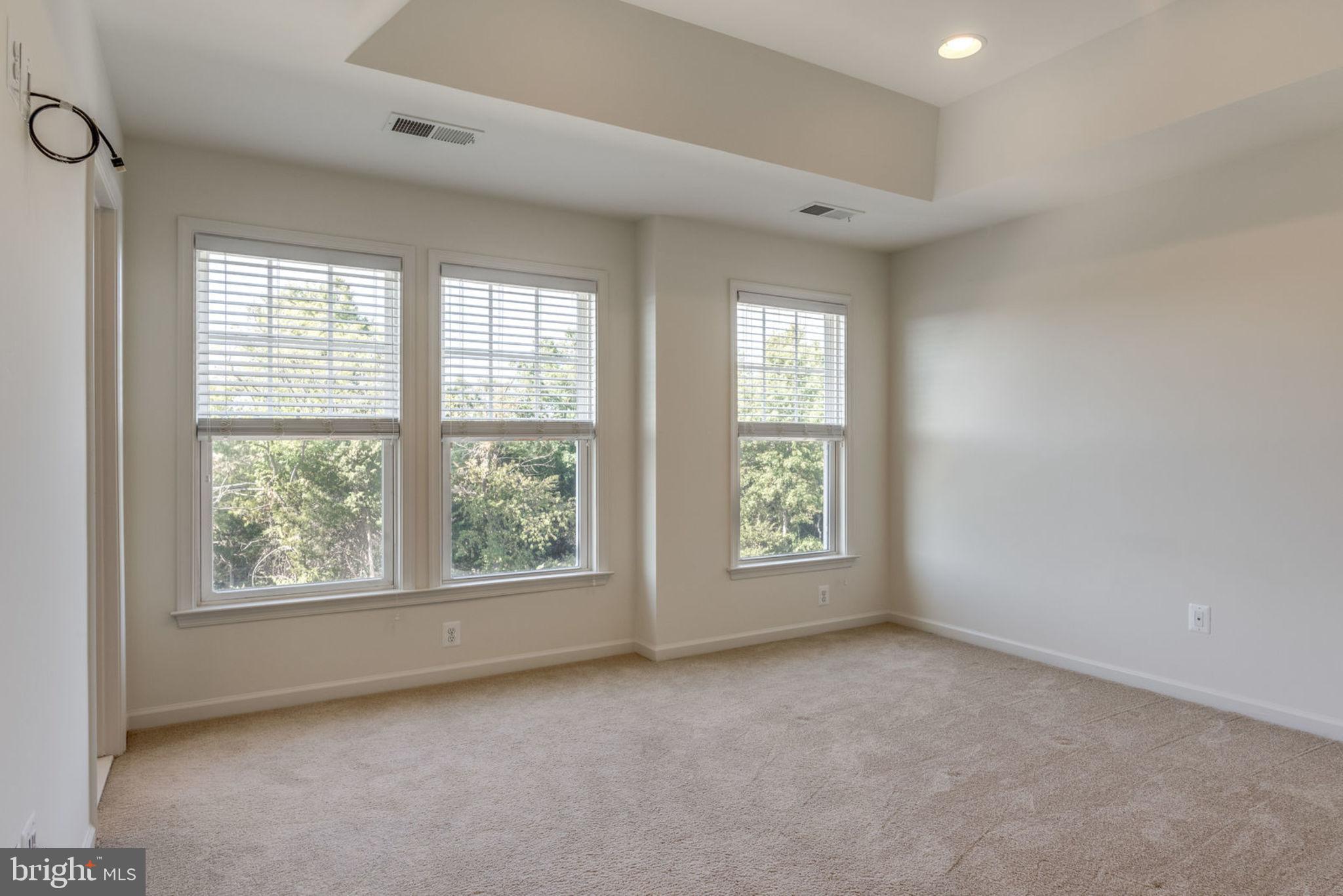 43453 Rickenbacker Square Ashburn, VA 20147 - Photo 3 of 31 Master bedroom has a tray ceiling detail
