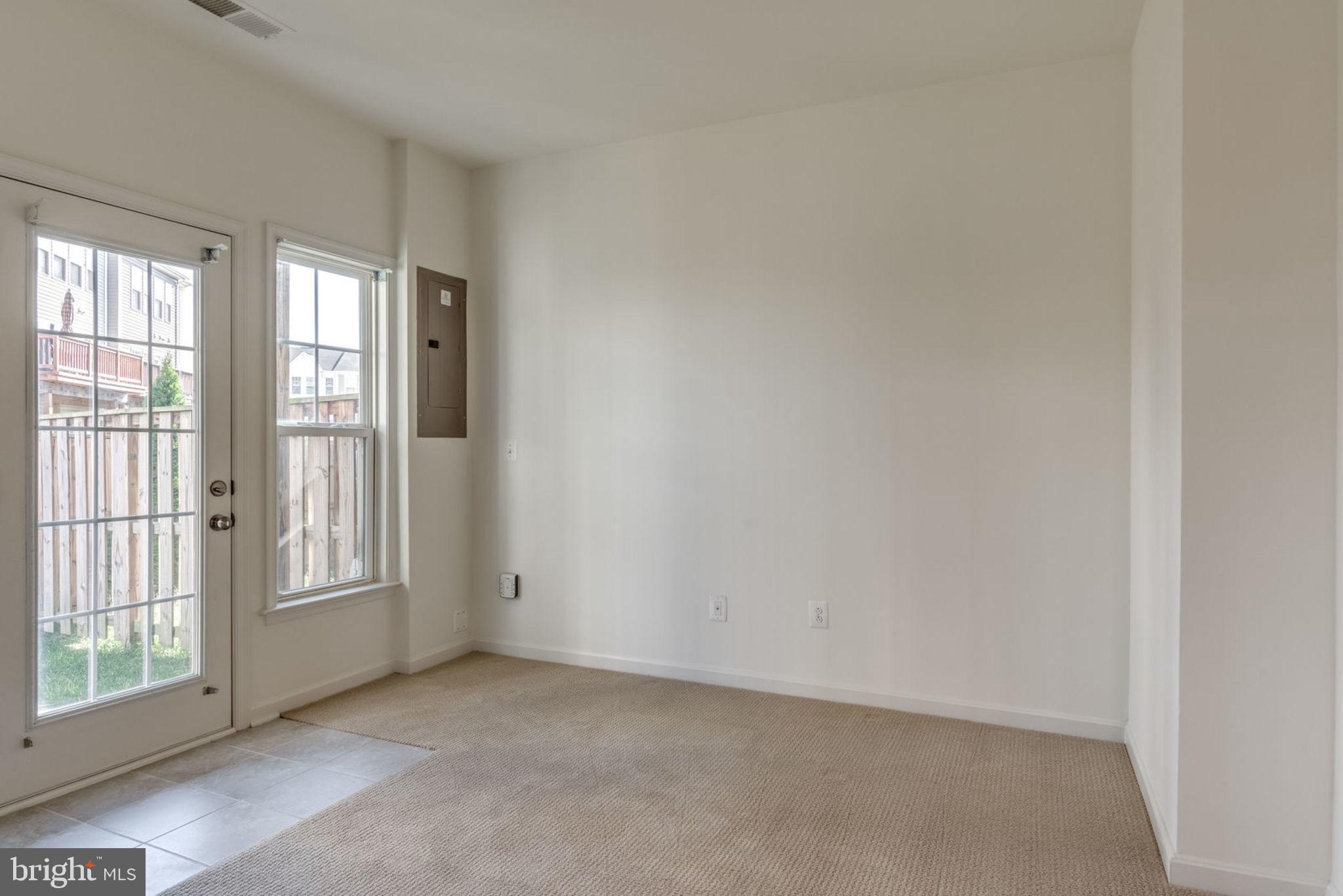 43453 Rickenbacker Square Ashburn, VA 20147 - Photo 6 of 31 Den has access to backyard