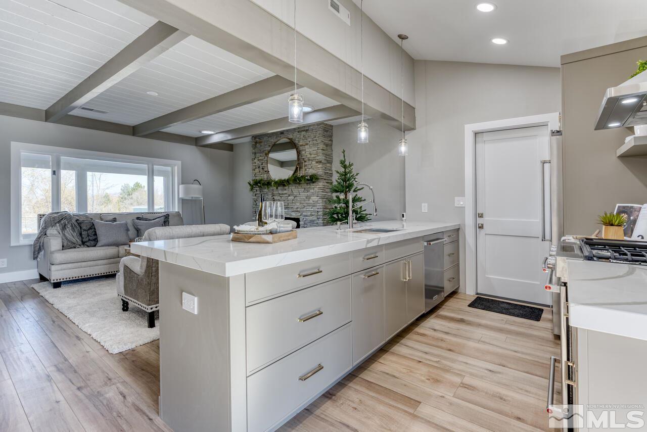 1025 Foothill Road Reno, NV 89511 - Photo 14 of 40 a spacious bathroom with a double vanity sink and a mirror