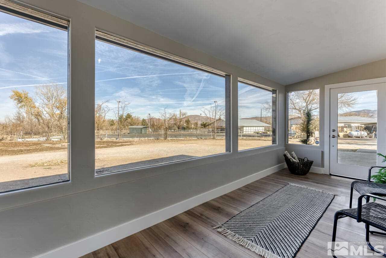 1025 Foothill Road Reno, NV 89511 - Photo 3 of 40 a living room with furniture and a large window