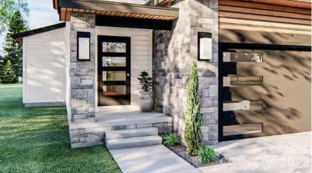 313 Iron Ridge Loop, Unit 16 Asheville, NC 28806 - Photo 2 of 9 a front view of a house with a porch