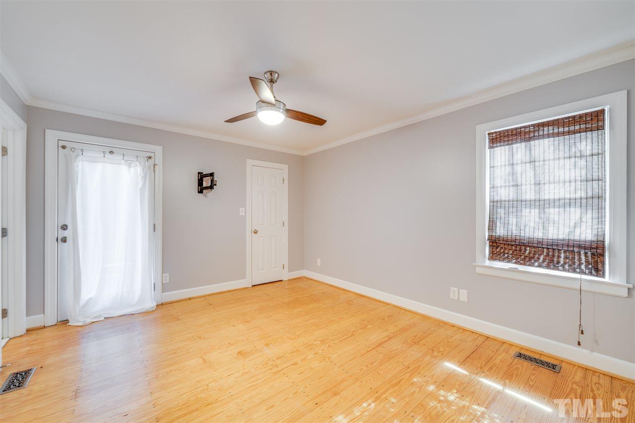 2116 Quail Ridge Road Raleigh, NC 27609 - Photo 12 of 30 a view of an empty room with a window