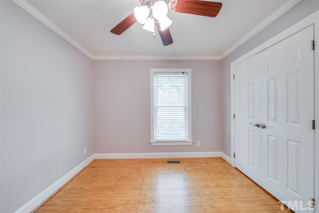 2116 Quail Ridge Road Raleigh, NC 27609 - Photo 16 of 30 a view of an empty room with a window