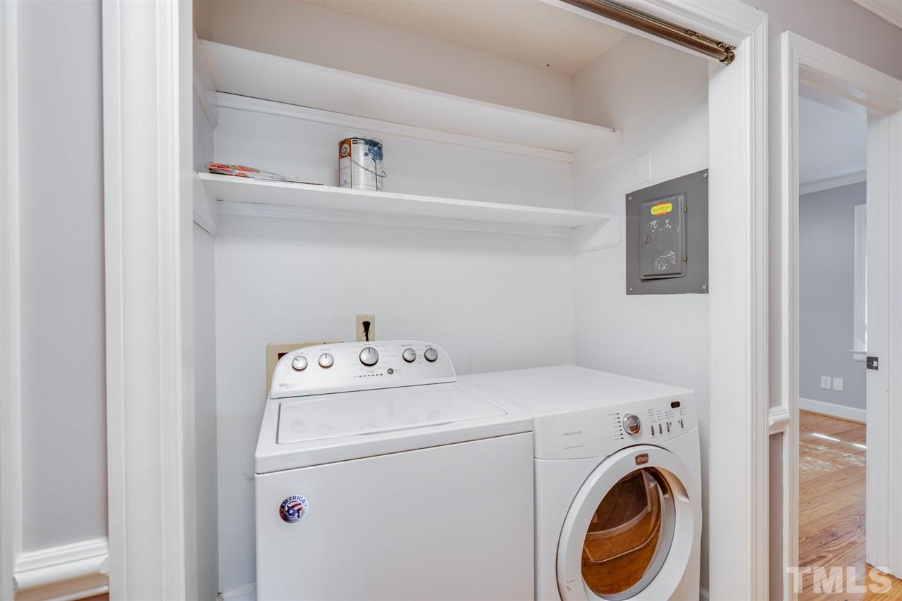 2116 Quail Ridge Road Raleigh, NC 27609 - Photo 20 of 30 a utility room with dryer and washer