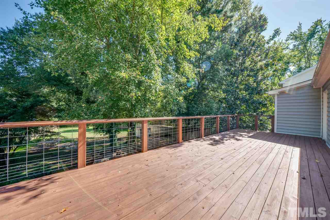 2116 Quail Ridge Road Raleigh, NC 27609 - Photo 21 of 30 a view of a wooden deck