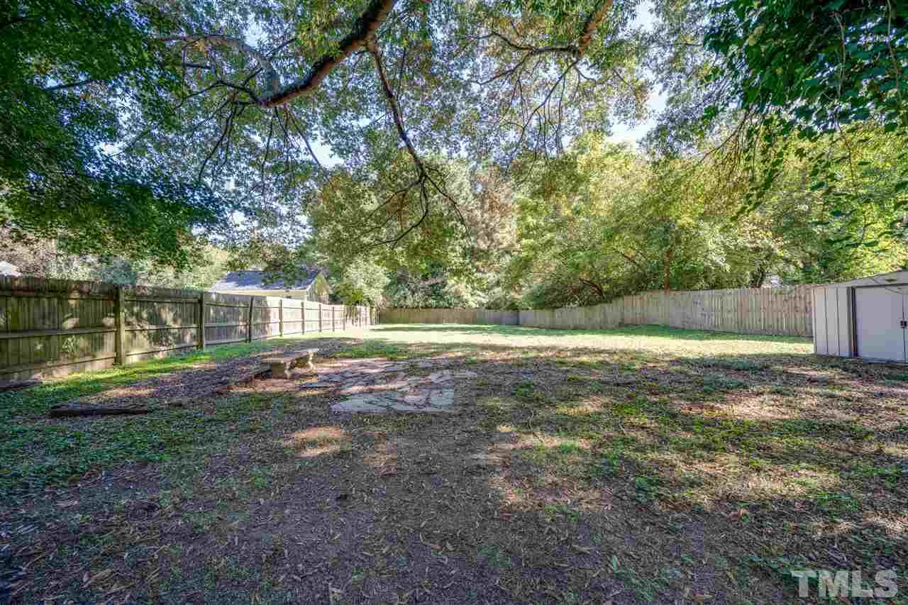 2116 Quail Ridge Road Raleigh, NC 27609 - Photo 26 of 30 a view of yard with tree
