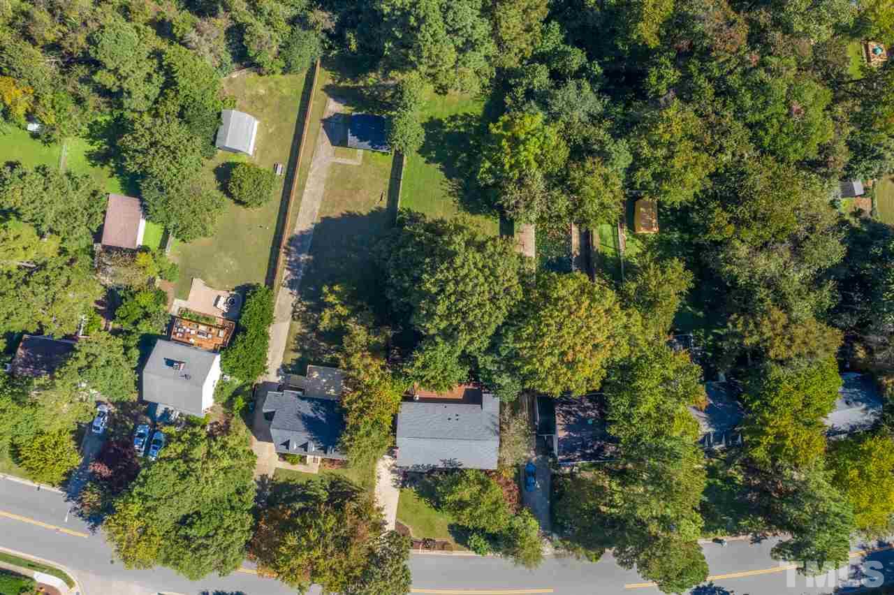 2116 Quail Ridge Road Raleigh, NC 27609 - Photo 28 of 30 an aerial view of a house with a yard