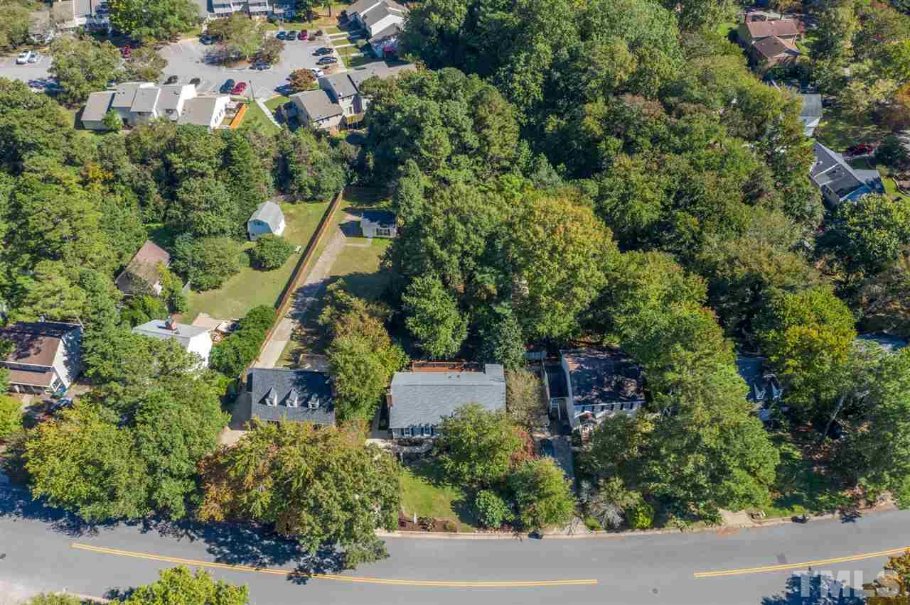 2116 Quail Ridge Road Raleigh, NC 27609 - Photo 30 of 30 an aerial view of a house with a yard and greenery