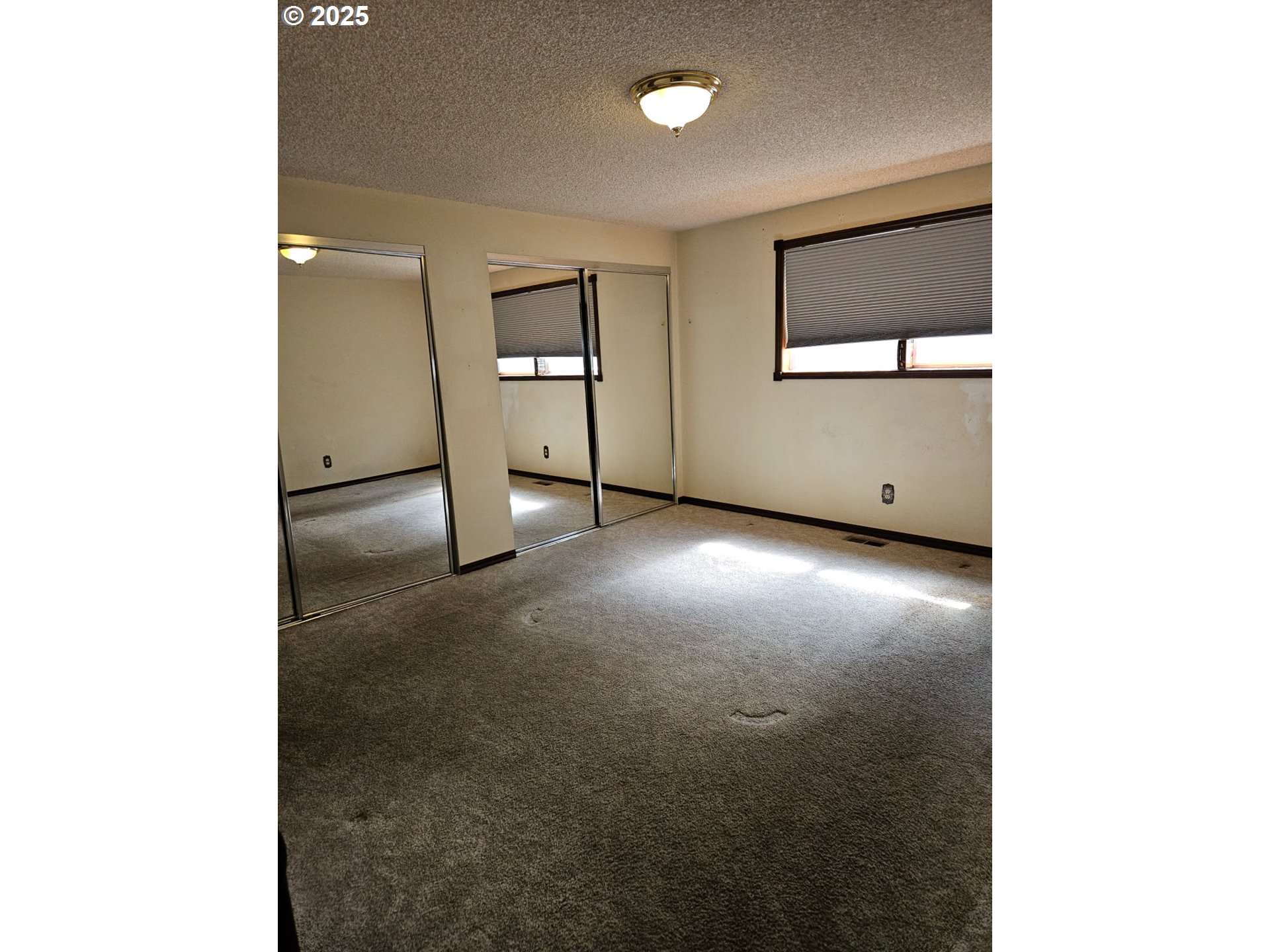 1179 Southeast Maple Place Gresham, OR 97080 - Photo 11 of 14 a view of a livingroom with wooden floor and a bathroom