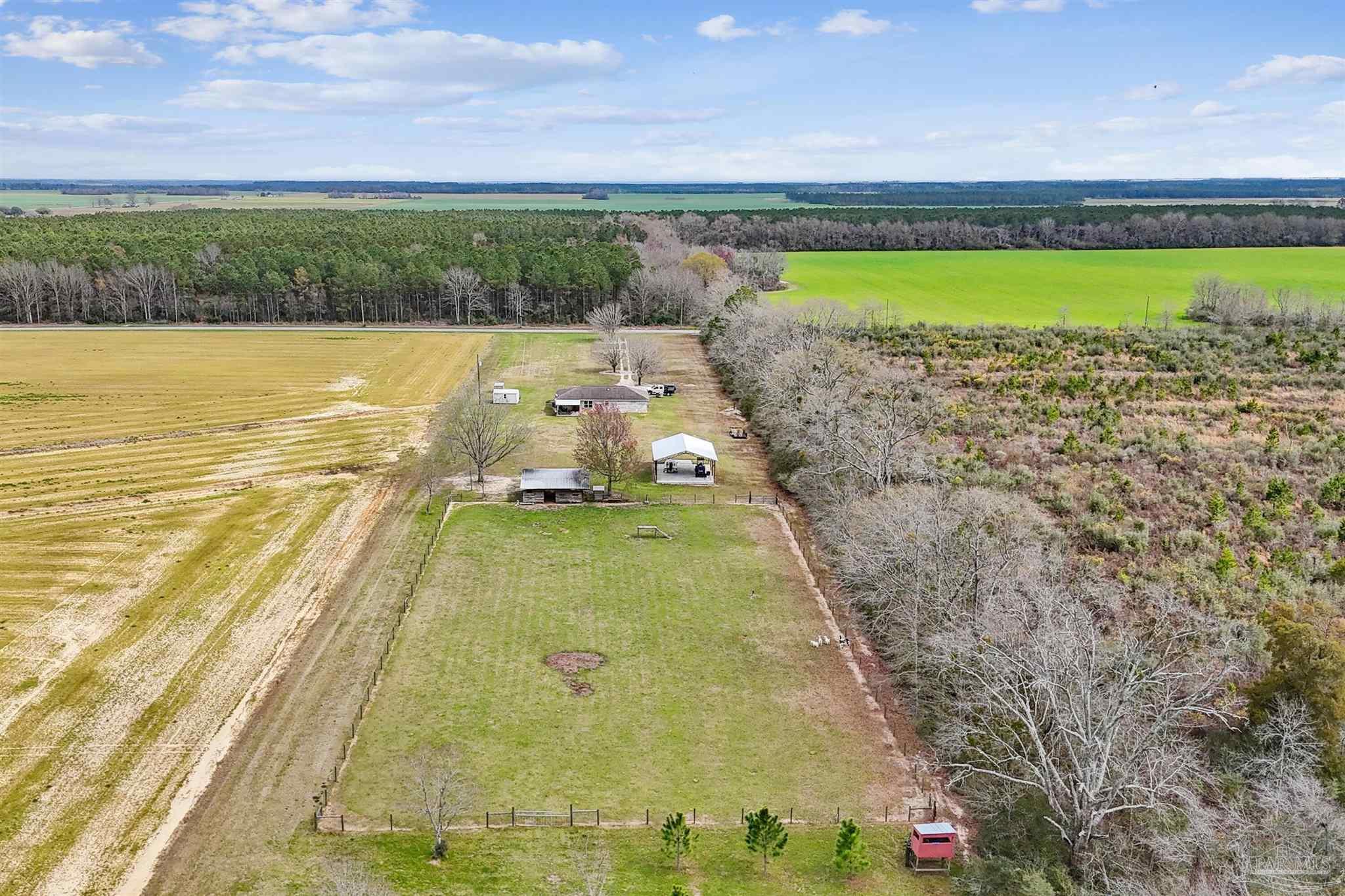 1911 Ard Field Road Jay, FL 32565 - Photo 2 of 47 a view of swimming pool with outdoor seating