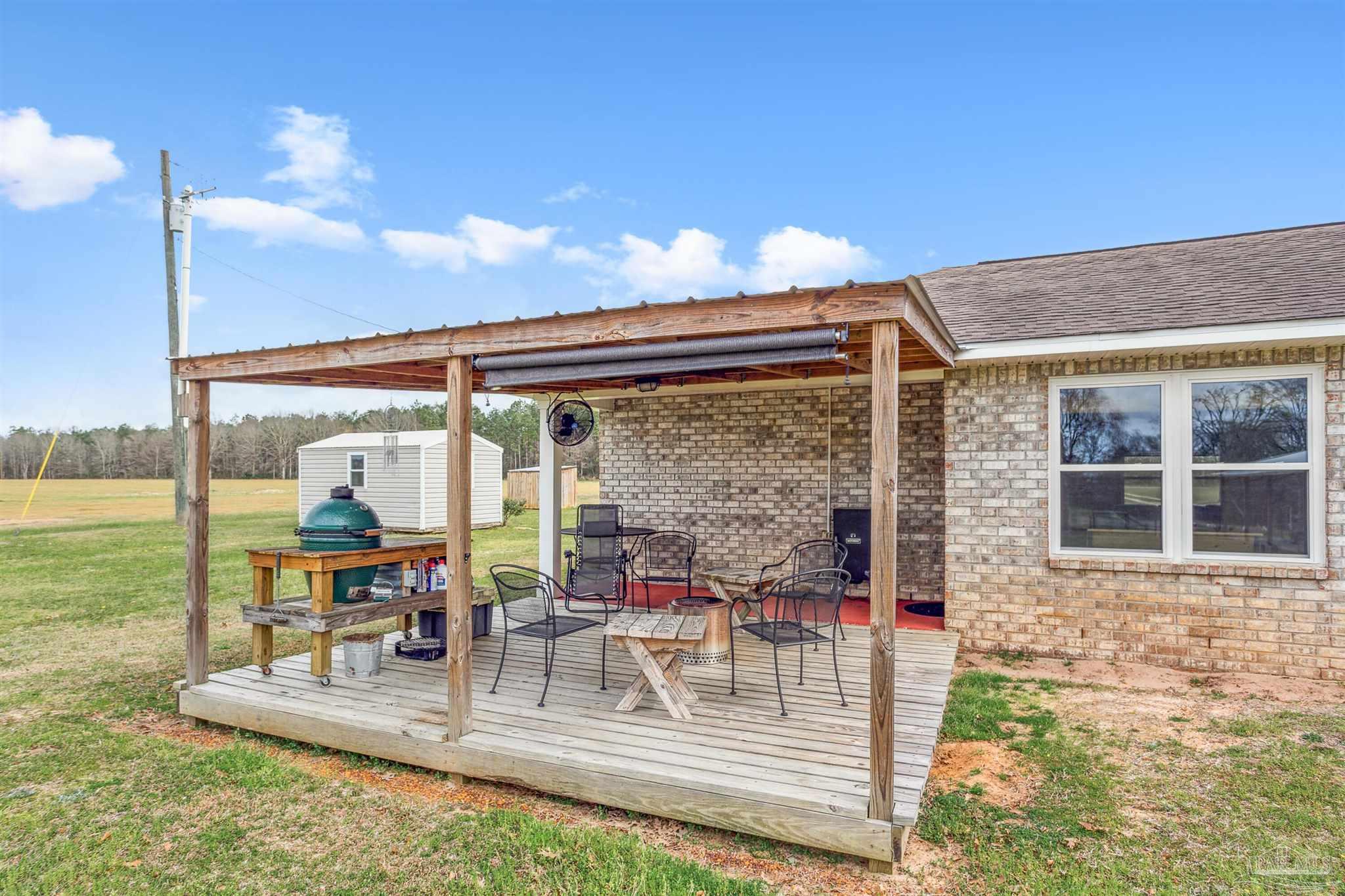 1911 Ard Field Road Jay, FL 32565 - Photo 26 of 47 a view of living room with patio