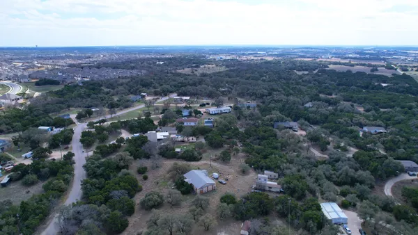 an aerial view of house with outdoor space