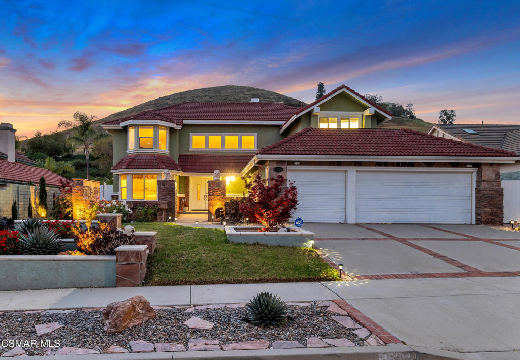 5339 Seneca Place Simi Valley, CA 93063 - Photo 1 of 76 a front view of a house with a yard