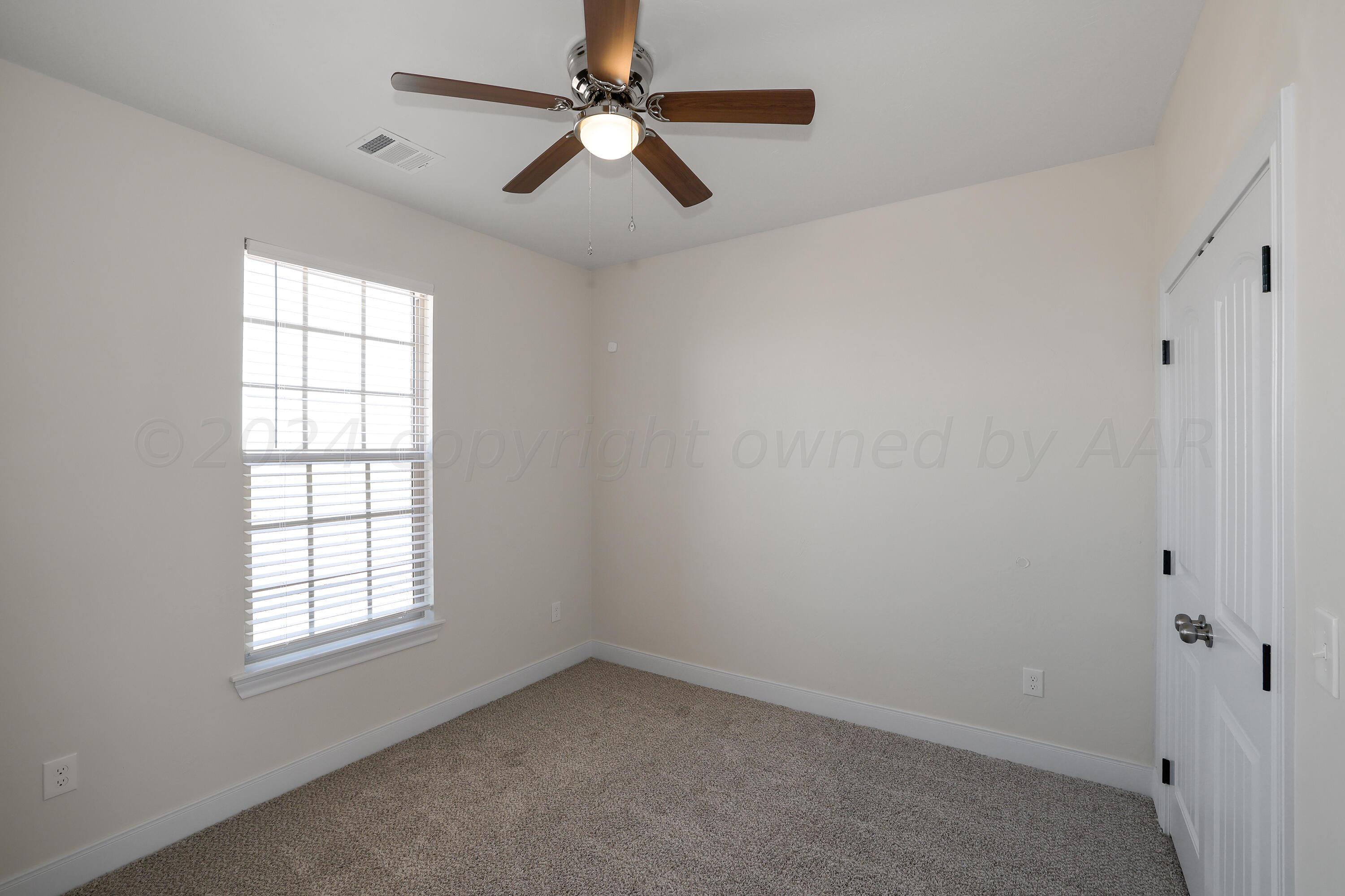 50 South Fm 2381 Amarillo, TX 79124 - Photo 16 of 31 an empty room with a window and a fan