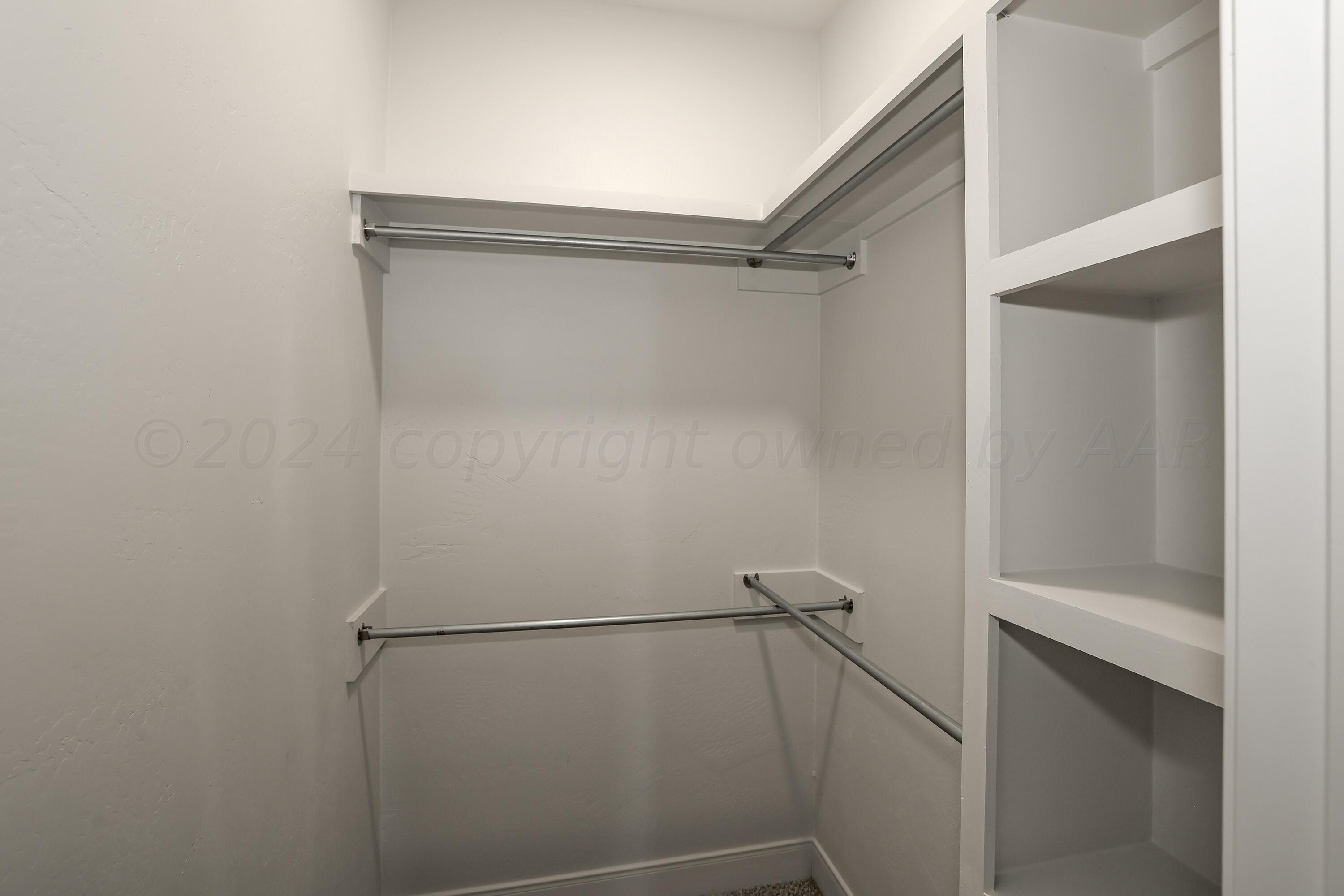 50 South Fm 2381 Amarillo, TX 79124 - Photo 26 of 31 a bathroom with a glass shower door