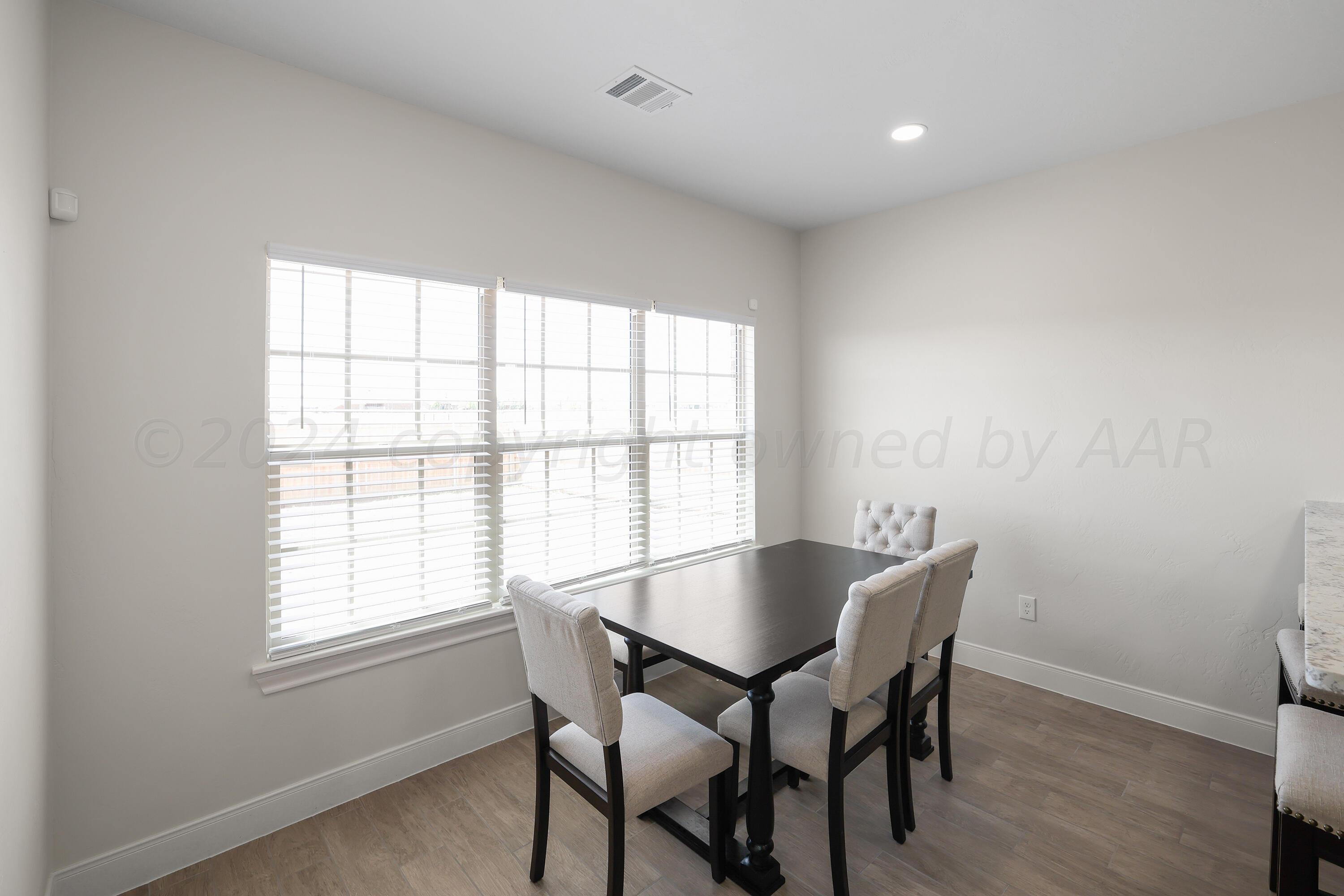 50 South Fm 2381 Amarillo, TX 79124 - Photo 10 of 31 a view of a dining room with furniture and a window