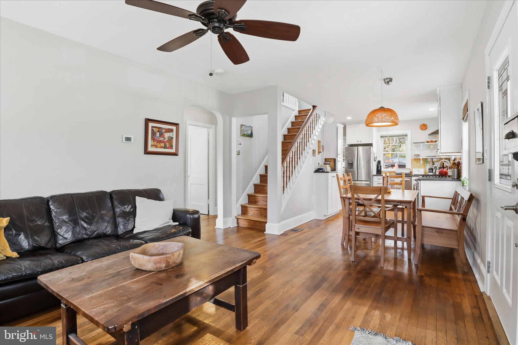 304 Highview Avenue Silver Spring, MD 20901 - Photo 11 of 48 a living room with furniture and a wooden floor