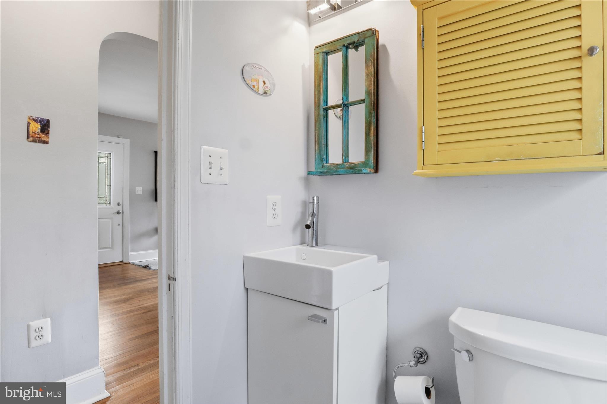 304 Highview Avenue Silver Spring, MD 20901 - Photo 20 of 48 a bathroom with a sink a toilet and shower