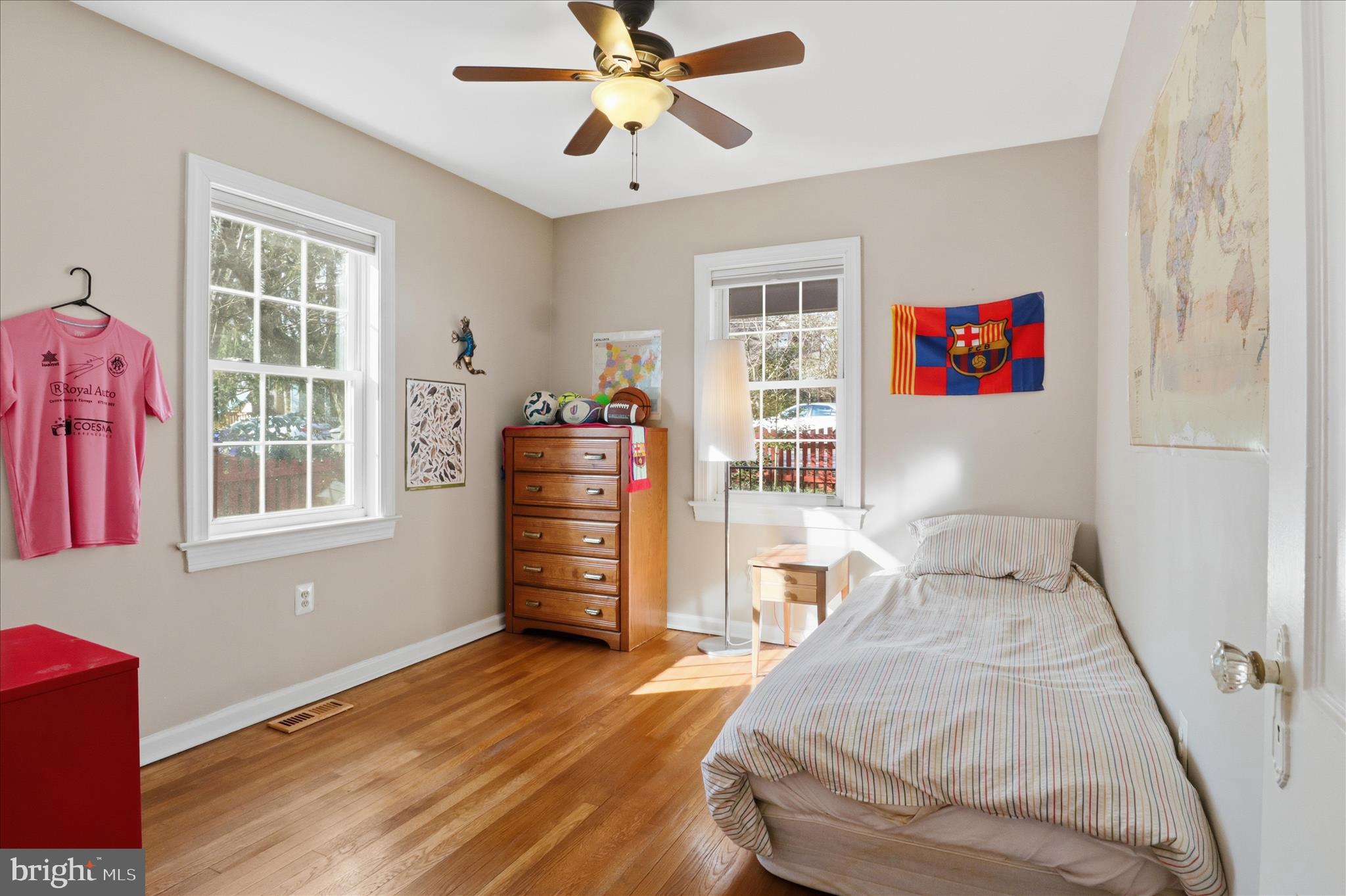 304 Highview Avenue Silver Spring, MD 20901 - Photo 21 of 48 a view of a livingroom with wooden floor and a ceiling fan