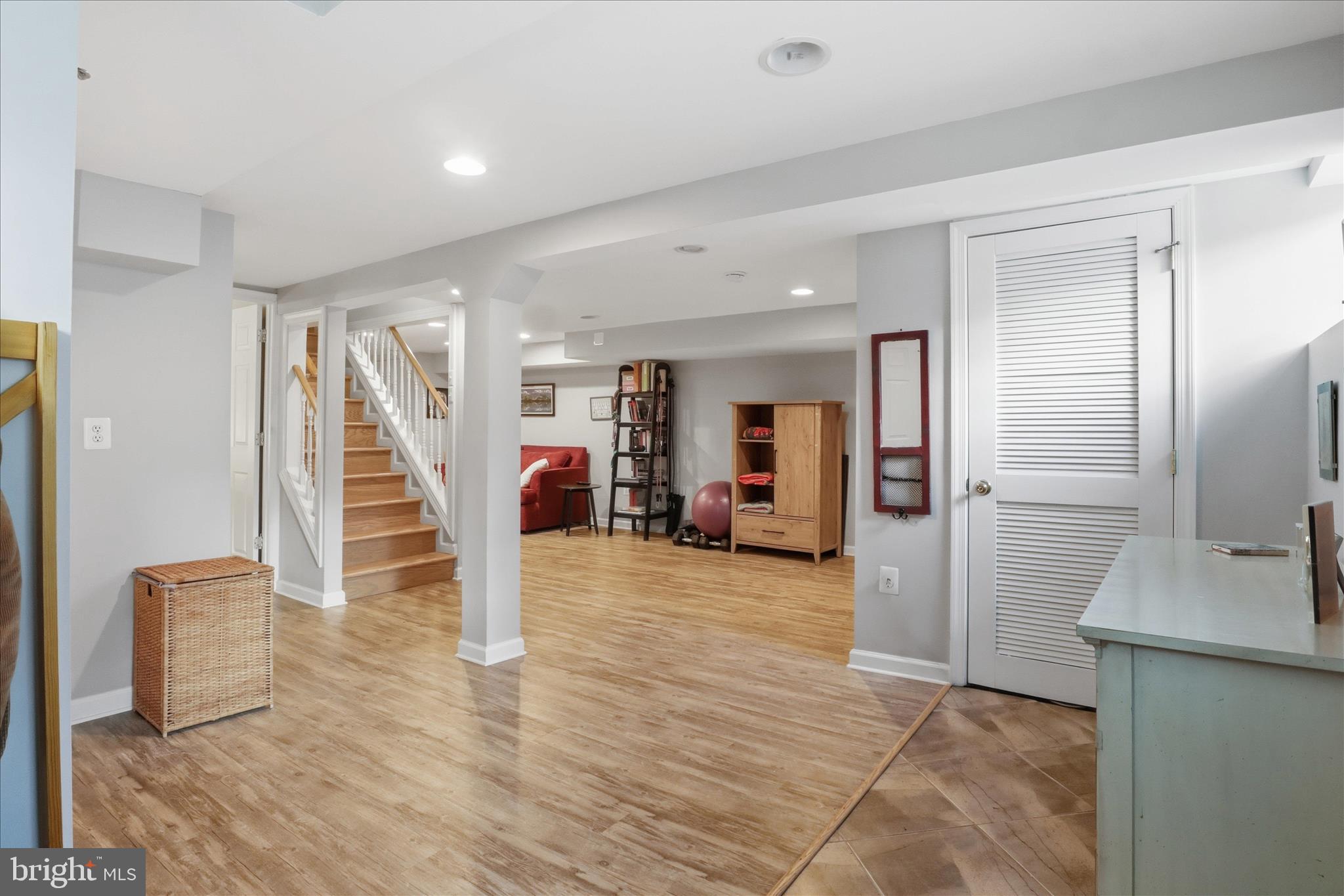 304 Highview Avenue Silver Spring, MD 20901 - Photo 26 of 48 a view of a hallway with wooden floor and staircase