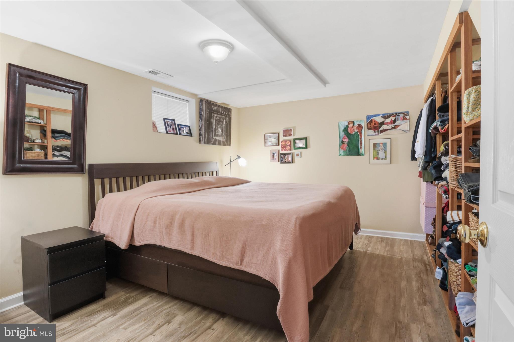 304 Highview Avenue Silver Spring, MD 20901 - Photo 28 of 48 a bedroom with a bed and a walk in closet