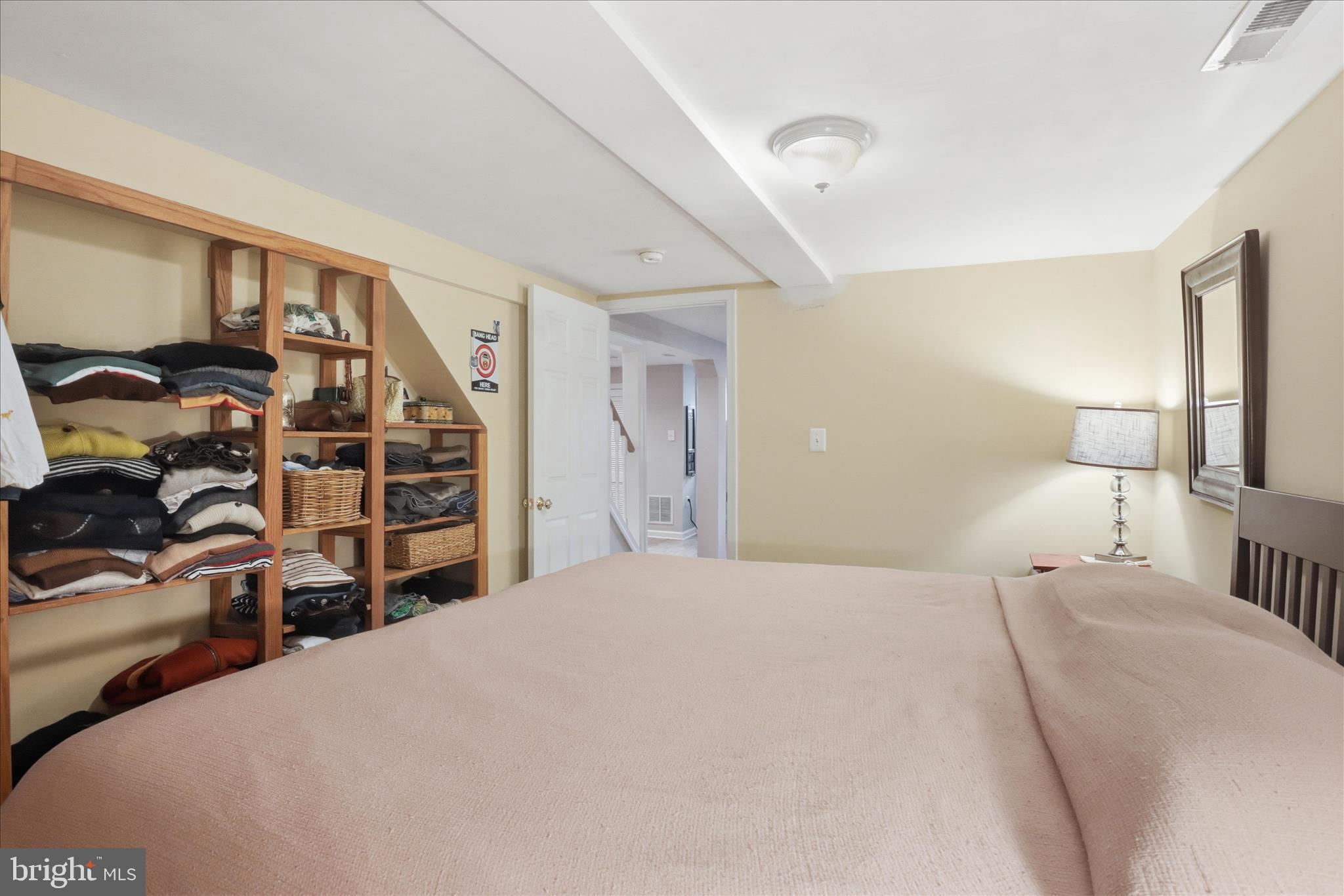 304 Highview Avenue Silver Spring, MD 20901 - Photo 29 of 48 a bedroom with a bed and closet