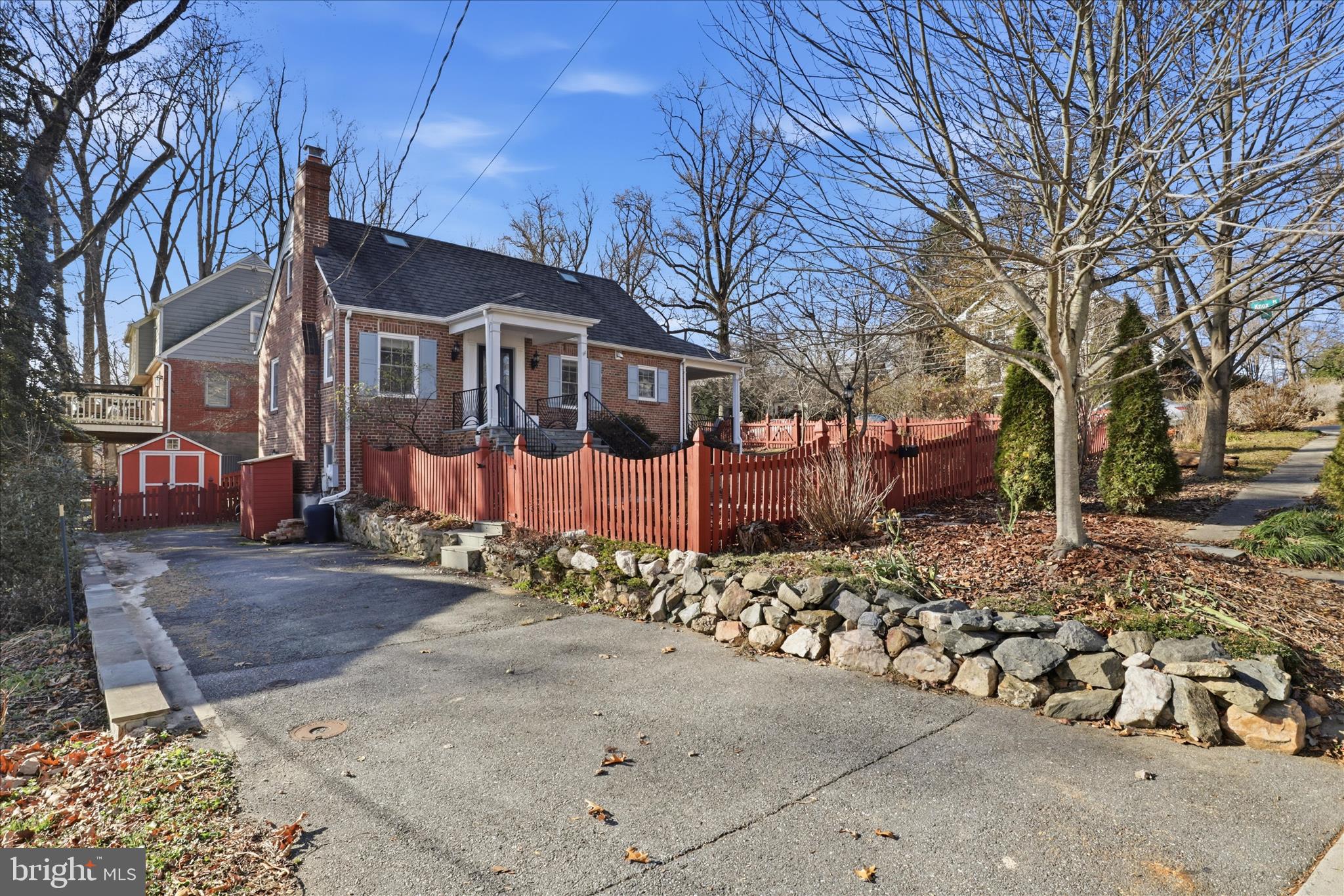 304 Highview Avenue Silver Spring, MD 20901 - Photo 5 of 48 a view of a house with a yard covered with snow